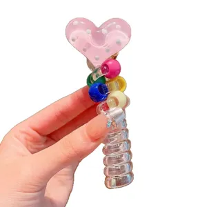 Cute dotted heart phone wire hair tie with colorful beads for high ponytail styling main view