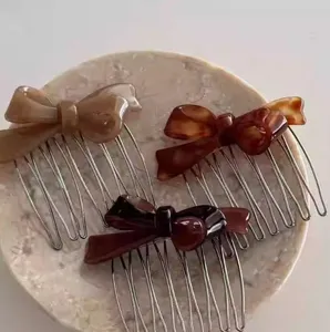 Acetaat strik haar kam elegante zijopstek clip vintage Franse haarstyling accessoire detail