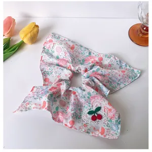 Pink cherry floral scrunchie detail view, sweet cute hair accessory with lace heart and lovely print.