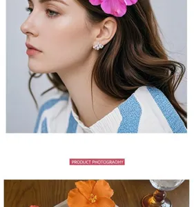 Exquisite artificial frangipani flower hair clip, Hawaiian style hair accessory detail view.