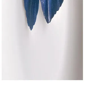 Blue clover jewelry detail shot, exquisite floral pendant close up view showcase.