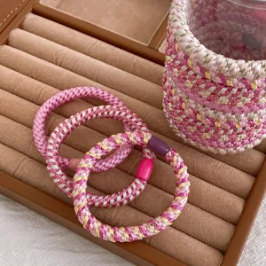 Pink woven hair ties high elasticity thick hair bands set with cute storage jar for women.