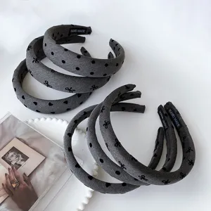 Korean style grey wide bow headband detail, cute dot patterned fabric hair hoop accessory.