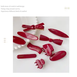 Red bow hair clip set, elegant glossy barrettes and claw clips for women and girls daily styling.