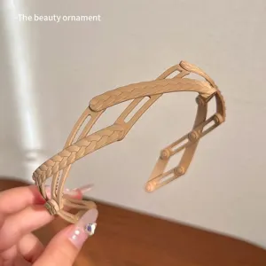 Cerchietto retrattile e pieghevole per donna, accessorio per capelli portatile beige.