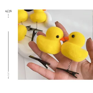 Simpatici fermagli per capelli con paperella gialla e molla, accessori peluche per uso quotidiano.