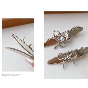 Silver metallic bow hair clip with pearls and rhinestones, stylish duckbill hair pin for women.