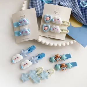 Deliziose mollette per capelli blu con nuvole, stelle e orsetti. Accessorio perfetto per ragazze.