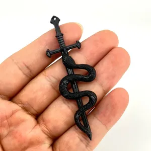 Retro black snake sword pendant close-up, alloy DIY jewelry accessory for crafts 77x25mm.