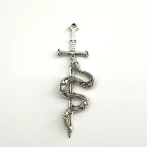 Detailed close-up of retro silver snake and sword alloy pendant, ideal for DIY jewelry crafts.