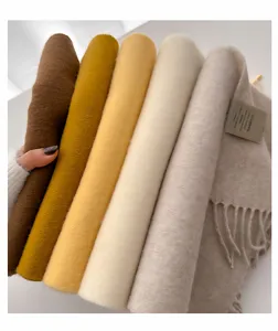 Detail showing soft texture and multiple color options for 100% Australian wool scarves