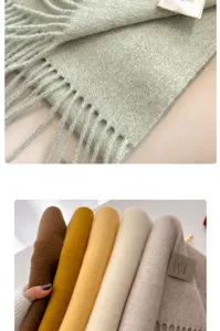 Close-up detail of 100% Australian wool scarf showing soft texture and washing label