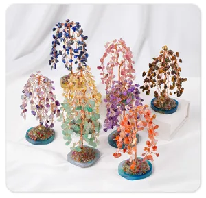 Collection of handcrafted crystal money trees with colorful stone leaves and agate bases.