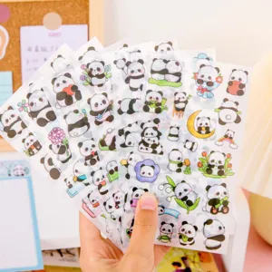 Closeup of cute cartoon panda transparent stickers, perfect for student journal DIY and stationery decor.