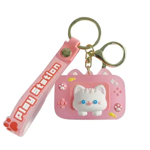 Süßer rosa Katzen Spielkonsole Silikon Schlüsselanhänger, cooler Rucksack Anhänger.