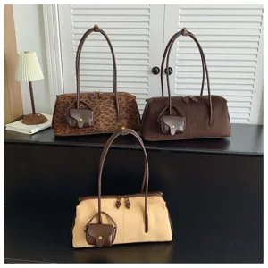 Stylish women suede shoulder bag retro underarm handbag with chic small coin pouch.