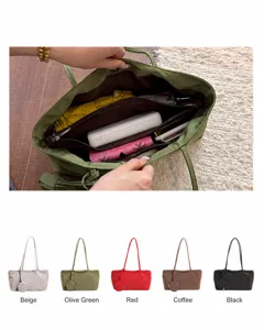 Minimalist women tote bag detail showcasing large capacity, inner zipper pockets and multi colors.