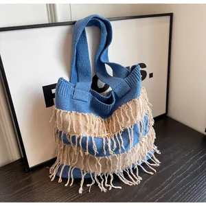 Stylish blue knitted tote bag with beige fringe, casual large capacity shoulder bag for women.