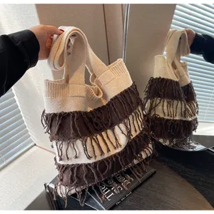 Knitted fringe shoulder bag detail, contrast color design, large capacity casual tote.