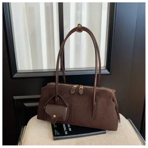 Brown suede shoulder bag for women, chic minimalist underarm handbag with mini pouch.