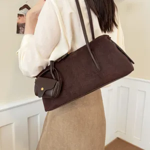 Stylish brown suede underarm shoulder bag for women, minimalist chic autumn fashion handbag.
