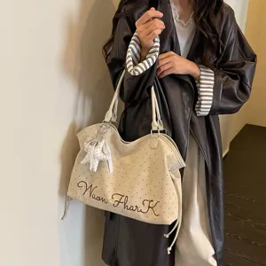 Korean style polka dot tote bag for women, large capacity autumn commuting shoulder bag detail.