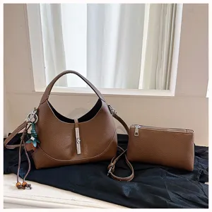 Detailed view of the 2026 new chic hobo dumpling bag with matching pouch and lock.