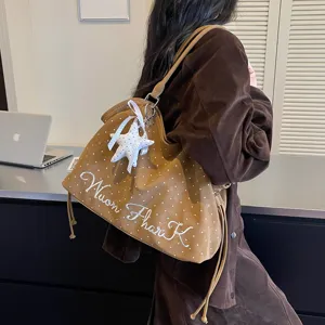 Korean style polka dot brown tote bag with star charm and embroidery detail for women commuting.