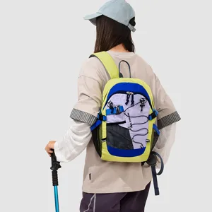 Detail view of colorful outdoor hiking backpack with multi pocket and elastic cord system.