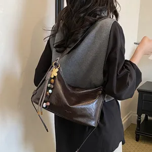 Stylish dark brown leather shoulder bag for women, large capacity crossbody hobo bag, autumn new.