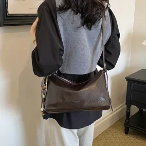 Dark brown casual shoulder bag for women, large capacity stylish crossbody bag detail view.