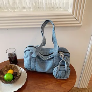 Vintage denim shoulder bag with mini pouch, casual stylish handbag for women daily commuting use.