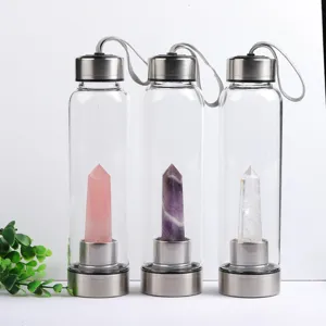 Reusable glass water bottle with natural quartz crystal obelisk pillar energy elixir