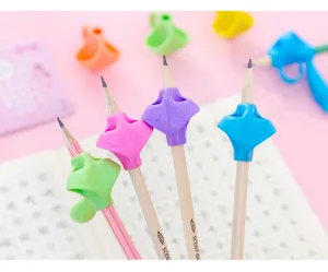 Ergonomic pencil grip for kids handwriting correction, colorful silicone pen holder for school.