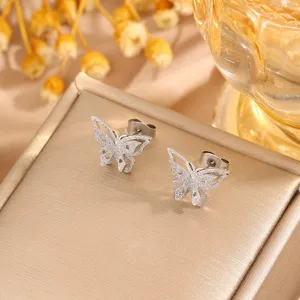 Stainless steel butterfly stud earrings for women, chic matte textured jewelry accessory.