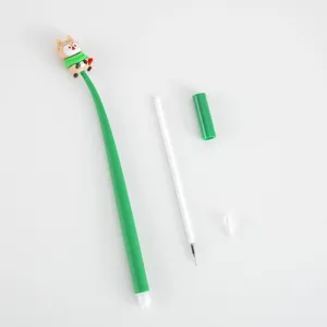 Christmas cute cartoon gel pen with silicone reindeer topper, green body, black ink writing.