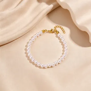 Pearl bracelet detail close-up view showing the elegant gold-plated clasp and smooth finish.