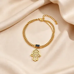 Exquisite gold stainless steel double layer bracelet with blue stone hamsa hand detail.