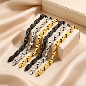 Detailed close-up shot of multi-color titanium steel link bracelets with fine craftsmanship.