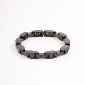 Black mechanical link titanium steel bracelet detail shot showing unique industrial chain design.