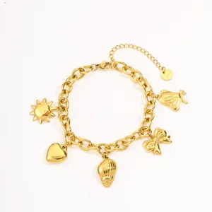 Gold plated titanium steel charm bracelet detail, retro multi-element design with cute charms.