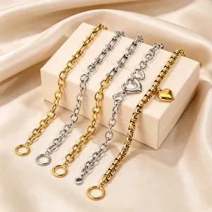 Detailed view of trendy stainless steel chain bracelets with heart pendants and OT clasps.