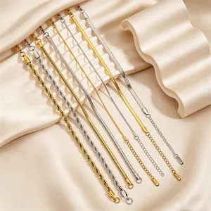 Stainless steel bracelet set featuring various chain styles like rope and snake chains in gold and silver.