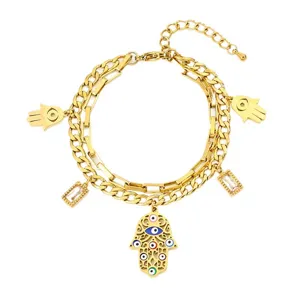 Gold stainless steel double layer Hamsa hand evil eye charm bracelet for women daily wear.