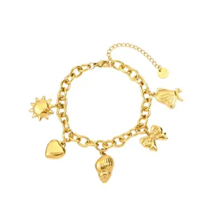 Gold plated titanium steel charm bracelet with multiple pendants like bow shell and sun.
