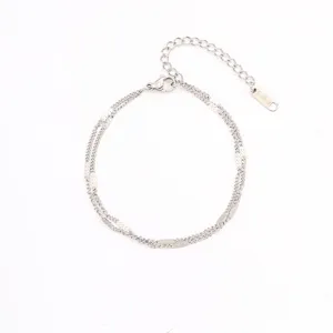 Stainless steel double layer chain bracelet for women minimalist chic jewelry item.