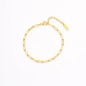 Gold stainless steel paperclip chain bracelet detail view showing clasp and link design.