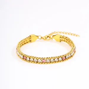 Gold titanium steel bracelet detail with sparkling white and pink zircon stones and extender.