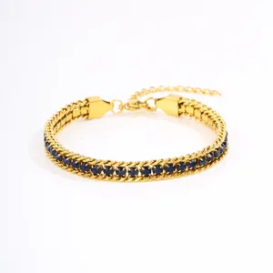Gold stainless steel bracelet for women featuring sparkling blue cubic zirconia stones, elegant design.