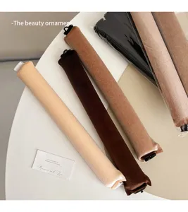 Heatless curling rod hair rollers for effortless big waves overnight styling soft velvet material.